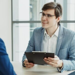 An employer meeting a job candidate
